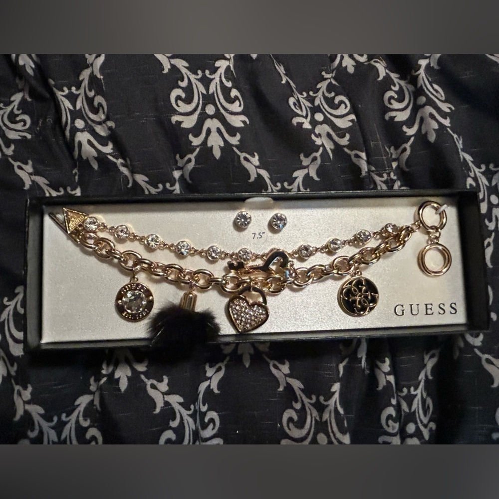 Guess  lose angels  bracelet with matching earrings set